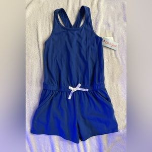 NWT. Little girls 1 piece romper. Brand: Cat & Jack.     Size: 6/7